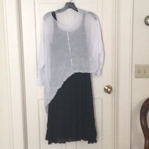 Sleeveless black crinkle dress with white topper